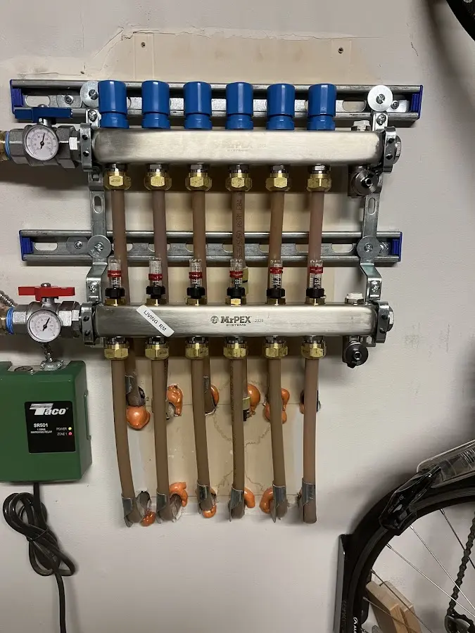 Plumber performing Water Heater Repair at a residential property in Kalama